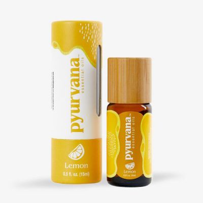 a bottle of 15ml lemon Pyurvana oil next to a cardboard tube